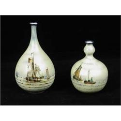 Two delft pottery vases, tallest 18cm...