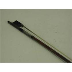 A violin bow with ebony, ivory and white m...