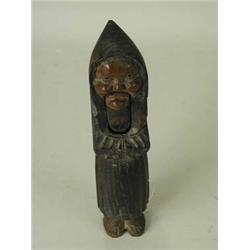 A carved softwood figural nut cracker. 22c...