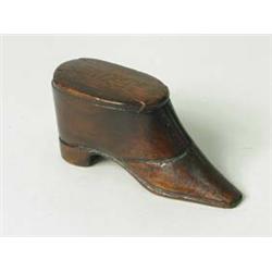 A treen snuff shoe, with brass stud decora...