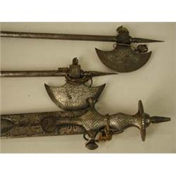 An Indian steel sword and two axes with de...