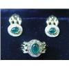 An 18ct gold cabochon emerald and diamond ...