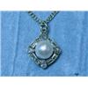 A yellow metal (tests 18ct) pearl and diam...