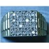 A 9ct gold gents ring set with sixteen dia...