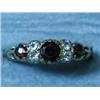 A 9ct gold engraved half hoop ring set wit...