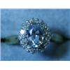 An 18ct gold aquamarine and diamond cluste...
