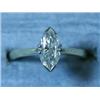 Image 1 : An 18ct gold marquise cut diamond ring, (a...