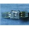 Image 1 : An 18ct gold princess cut diamond solitair...