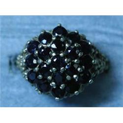 A 9ct gold sapphire cluster ring, size M...