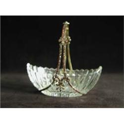 An early 20th century cut glass basket wit...