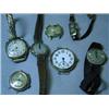 Image 1 : Various watches and watch faces, including...