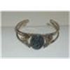 Image 1 : Bangle Bracelet 2 1/2" side to side Natural Black Speckled Stone is 1"  Oval