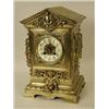 Image 1 : A Victorian brass mantel clock, with ornat...