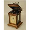 Image 1 : A rare walnut cased polyphon mantel clock,...