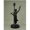 Image 1 : A Spelter table lamp in the form of a boy,...