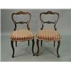 Image 1 : A pair of rosewood balloon back dining cha...