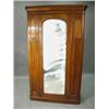 Image 1 : A Victorian mahogany mirror door wardrobe....