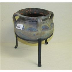 Indian Design Pottery with metal stand overall height in stand is 9.5  x 6.5 diameter