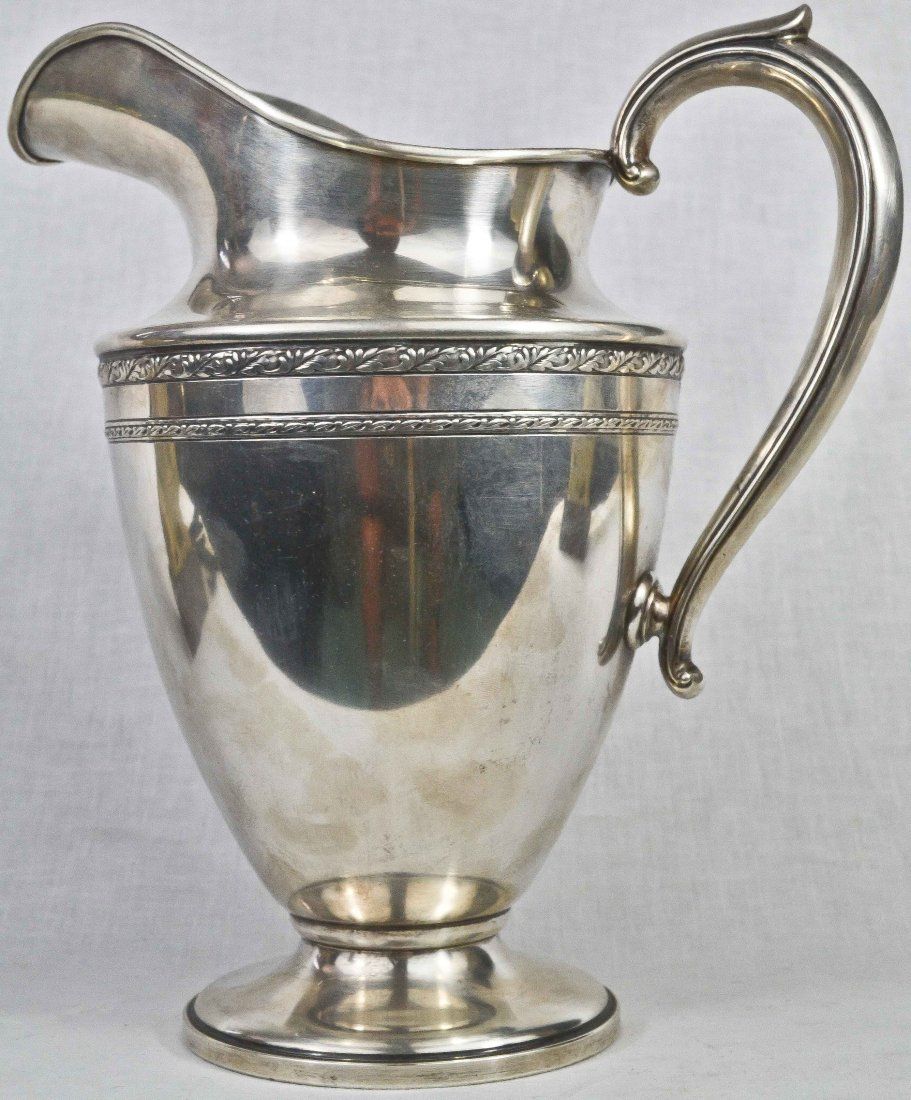 Antique large sterling silver pitcher. Hallmarked
