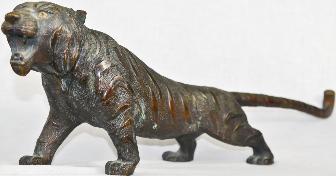 Large antique Chinese bronze tiger. Signed