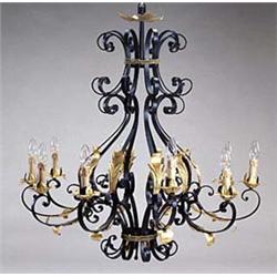 A wrought iron ten light chandelier, each...