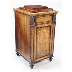 A mahogany pedestal cabinet with a square...