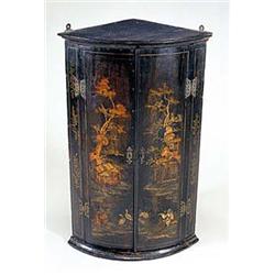 A 19th century japanned bowfronted hanging...