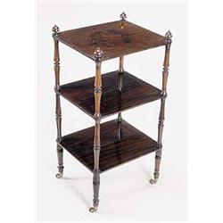 An early Victorian rosewood whatnot, with...