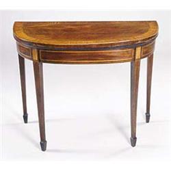 A late George III mahogany bow fronted car...