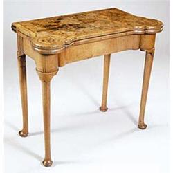 A mid 18th century fruitwood and burr waln...
