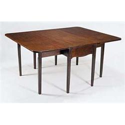 A George III mahogany drop leaf table, the...