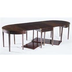 A mahogany "D" end dining table with four...