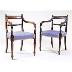 A pair of George IV mahogany elbow chairs,...