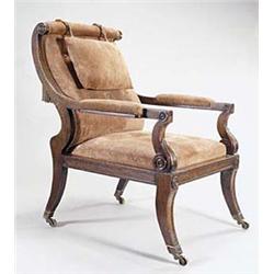 A pair of rosewood library armchairs in Ge...