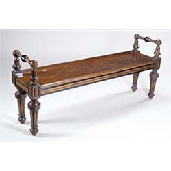 A Victorian oak and ebonised bench by John...