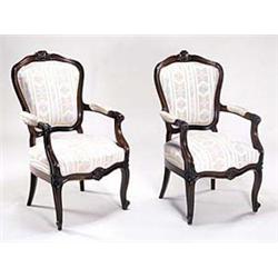 A pair of 19th century rosewood open armch...
