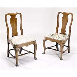 A pair of George I walnut side chairs, eac...