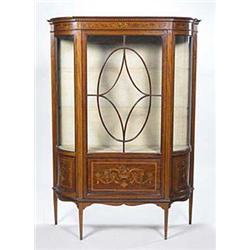 An early 20th century mahogany and marquet...