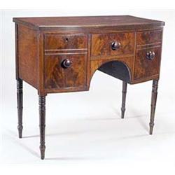 A George IV mahogany bowfronted sideboard,...