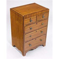 An early 19th century satinwood and ebony...