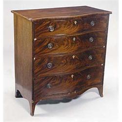A George III mahogany serpentine chest, th...