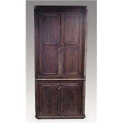 A George III mahogany standing corner cupb...