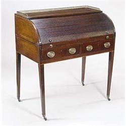 A late George III mahogany desk, with a la...