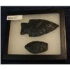 Image 1 : 11. Flintnappers Special. (2) Indian Relics chipped from Black Obsidian, all displayed in a glass fa