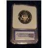 Image 2 : 1332. 2007 S Kennedy Half. IGS slabbed "PR-70 DCAM First Day of Issue".