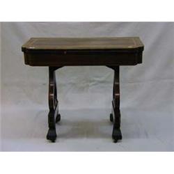 A Regency inlaid rosewood card table raised...