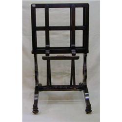 A 19th Century mahogany folio stand, raised...