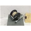 Image 2 : PENN REEL IN BOX WITH PAPERS