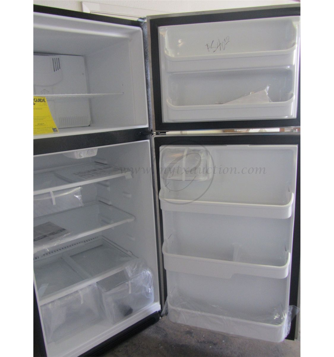 Frigidaire 20.6 Cubic Foot Top Freezer Refrigerator SCRATCH AND DENT