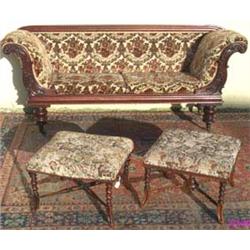 Early Victorian mahogany & upholstered sofa with carved foliate scroll arms